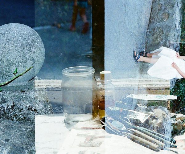 A balanced composition of natural elements like stones, water, and leaves.