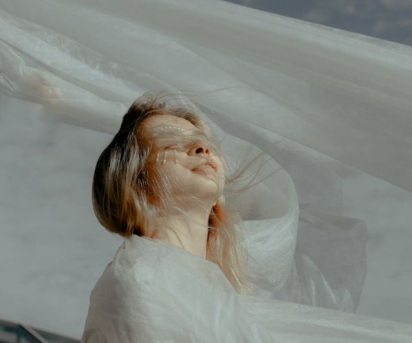 Person feeling energized and calm in a natural outdoor setting.